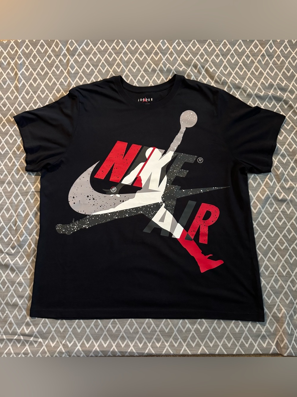 Jordan Black Short-Sleeve Graphic Tee with Red and Gray Logo